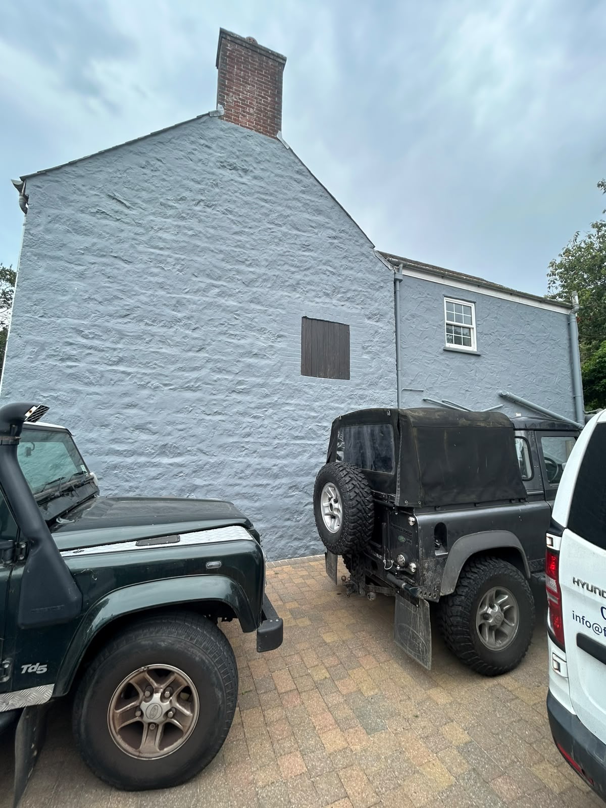 Gable end and chimney freshly painted slate grey