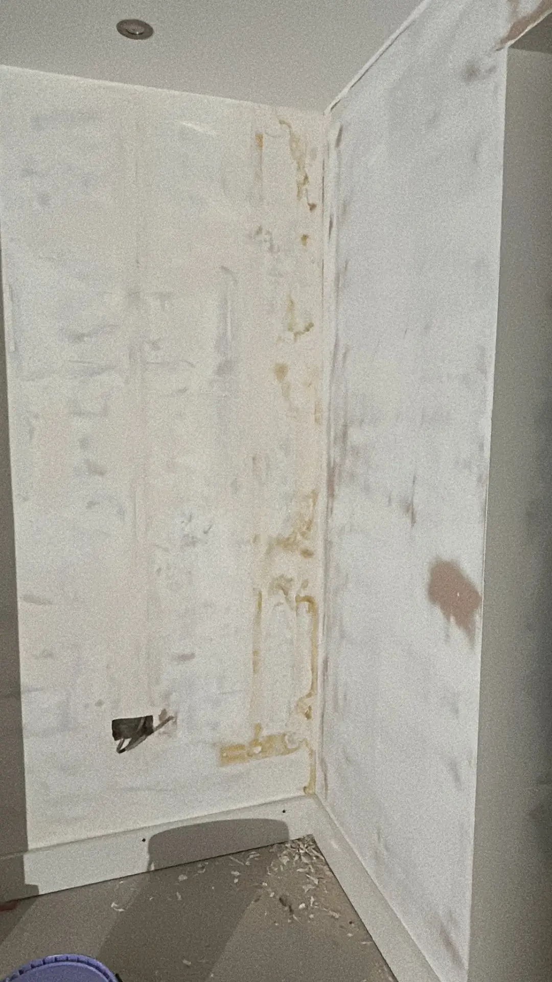 Hallway before — plasterboard walls with taped joints