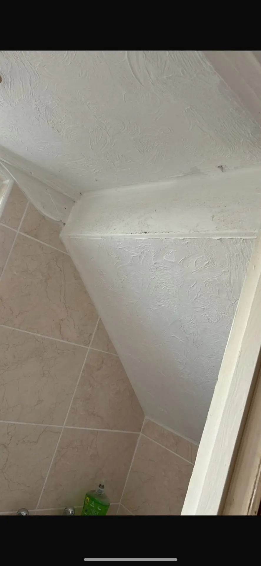 Loft room before — unfinished plasterboard with bare door