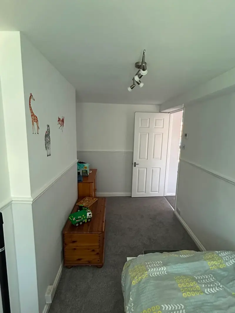 Painted doors and skirting woodwork in a Guernsey house decorated by Woody's Decorating