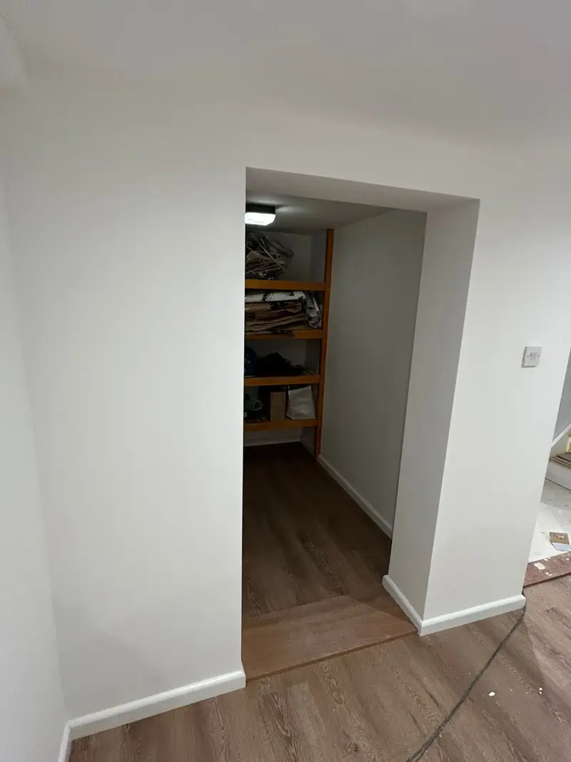 Whole-room interior repaint finished in a warm neutral shade