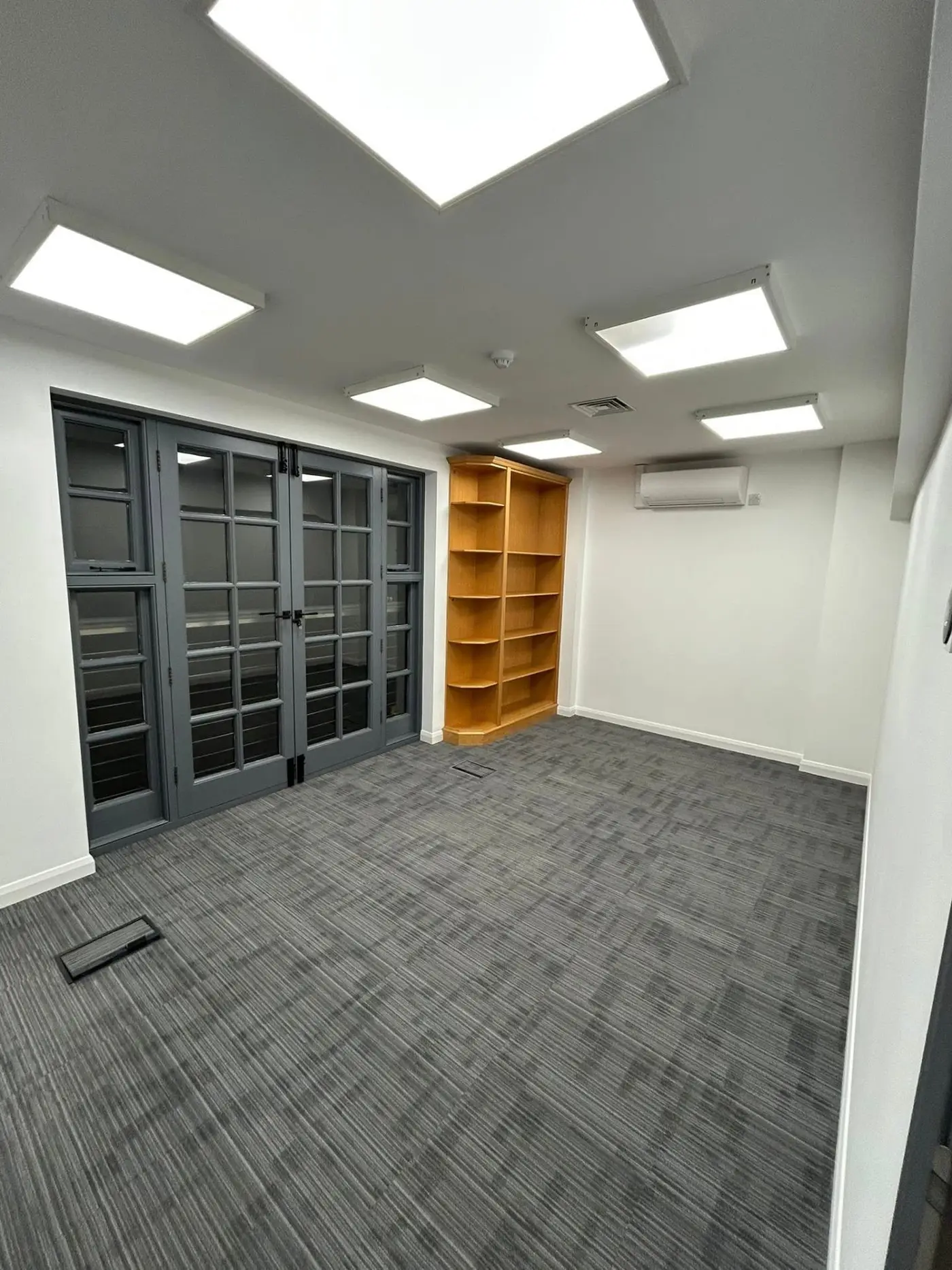 Private office suite with painted French doors and trim
