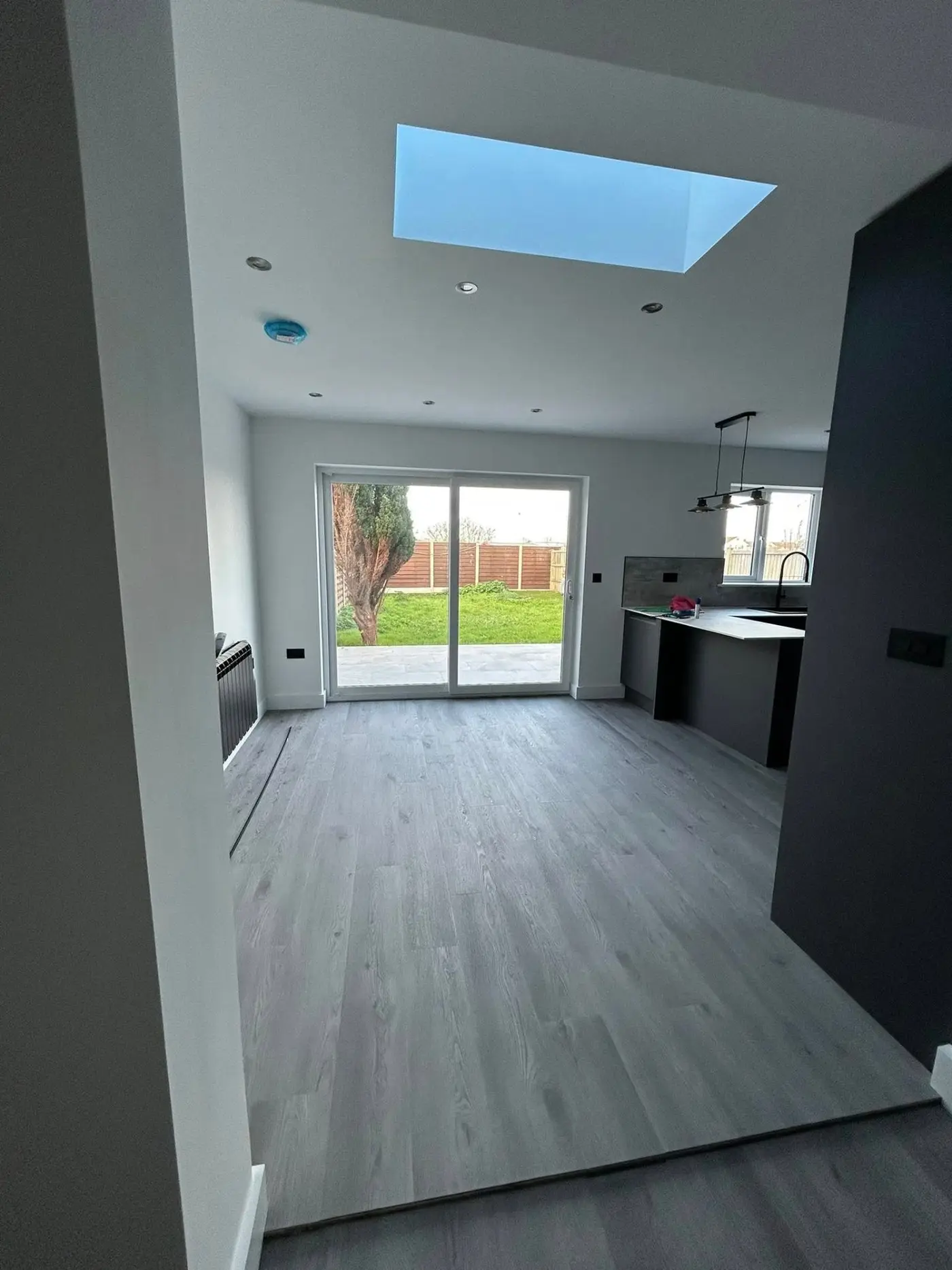 Full house conversion — finished open-plan living space with skylight